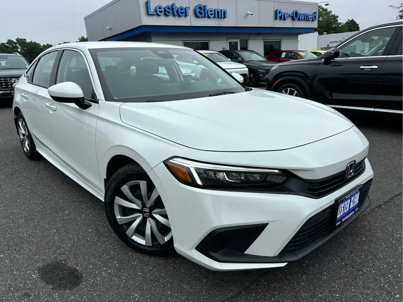 2024 Honda Civic LX in Platinum White Pearl — front three-quarter view