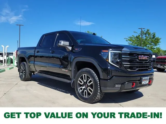 2023 GMC Sierra 1500 AT4 in Onyx Black — front three-quarter view