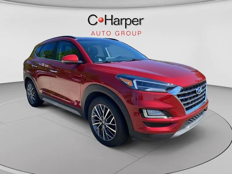 2021 Hyundai Tucson Ultimate in Red — front three-quarter view