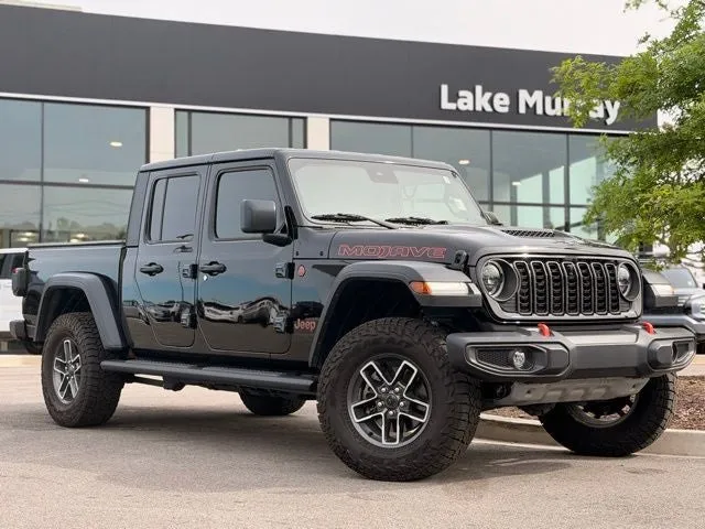 2024 Jeep Gladiator Mojave in Black Clearcoat — front three-quarter view