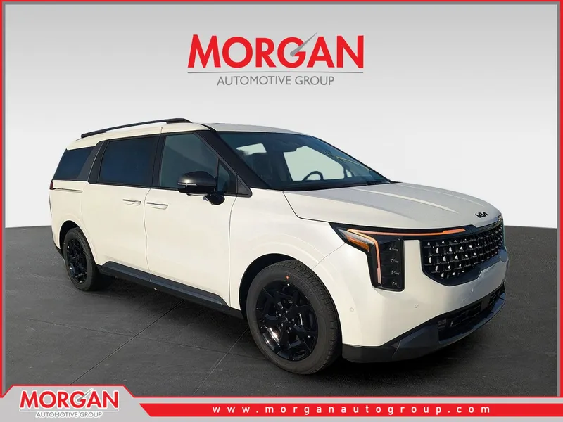 2026 Kia Carnival Hybrid SX Prestige in Snow White Pearl — front three-quarter view