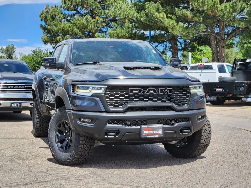 2026 RAM 1500 RAM 1500 RHO CREW CAB 4X4 5'7' BOX in Forged Blue Metallic Exterior Paint — front three-quarter view