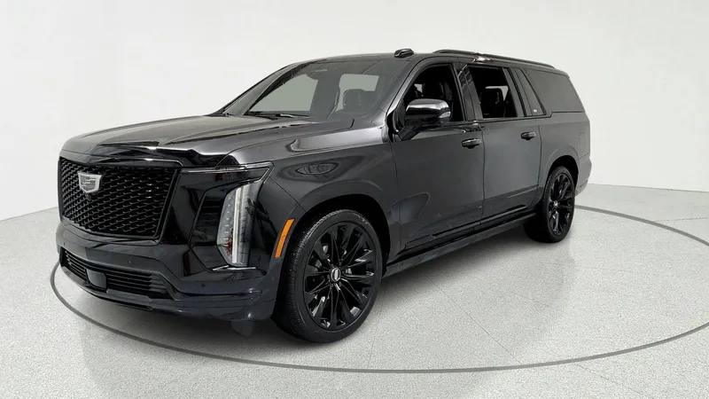 2026 Cadillac Escalade ESV Platinum Sport in Black Raven — front three-quarter view