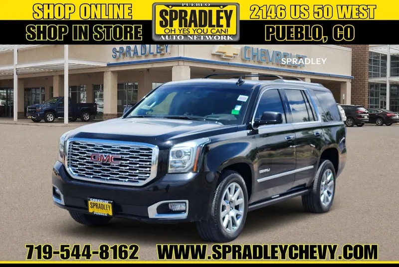 2019 GMC Yukon Denali in Onyx Black — front three-quarter view
