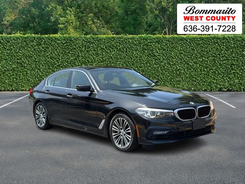 2018 BMW 5 Series 530e xDrive iPerformance Plug-In Hybrid in Black Sapphire Metallic — front three-quarter view