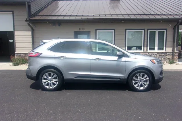 2022 Ford Edge Titanium in Iconic Silver Metallic — front three-quarter view