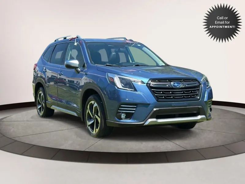 2023 Subaru Forester Touring CVT in Blue — front three-quarter view