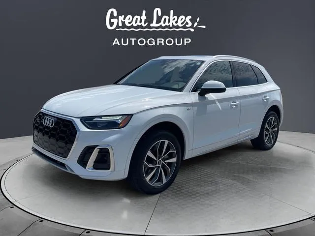 2024 Audi Q5 45 S line Premium quattro in Arkona White — front three-quarter view