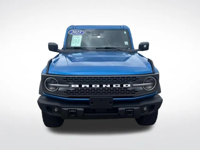 2025 Ford Bronco Badlands in Blue Metallic — front three-quarter view