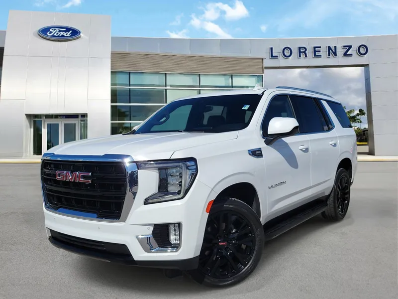 2021 GMC Yukon SLE in Summit White — front three-quarter view