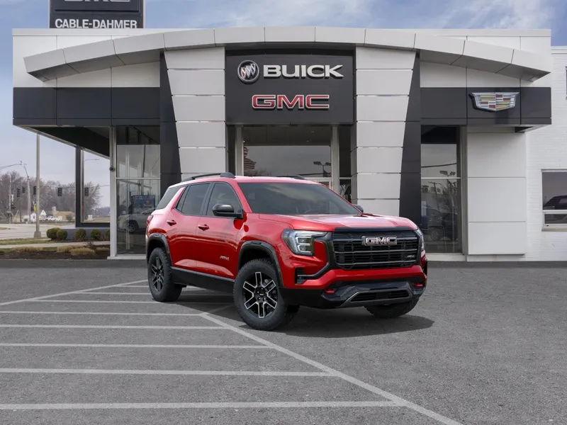 2026 GMC Terrain AT4 in Volcanic Red Tintcoat — front three-quarter view