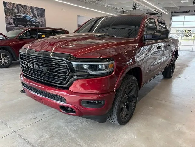 2023 RAM 1500 Limited Crew Cab 4x4 5'7' Box in Delmonico Red Pearlcoat — front three-quarter view