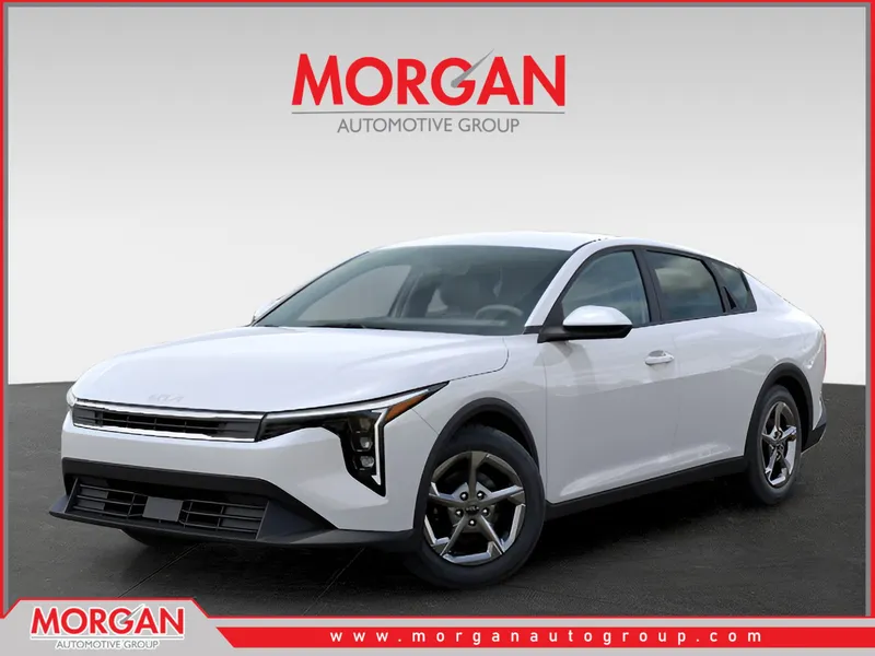 2026 Kia K4 LXS in Snow White Pearl — front three-quarter view