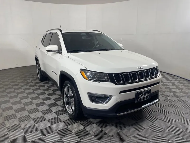 2019 Jeep Compass Limited 4x4 in White Clearcoat — front three-quarter view