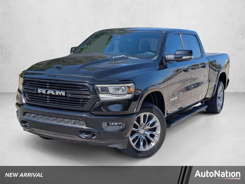 2022 RAM 1500 Laramie Crew Cab 4x4 6'4" Box in Black — front three-quarter view