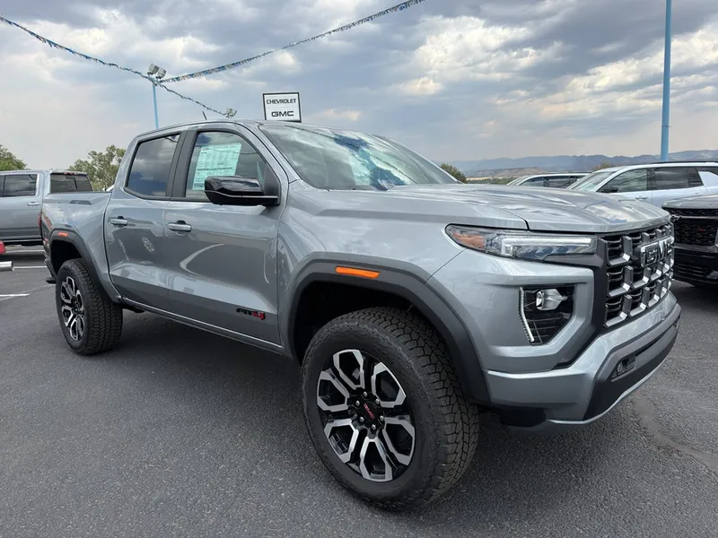2026 GMC Canyon AT4 in Sterling Metallic — front three-quarter view