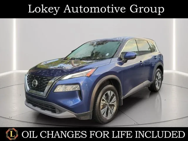 2021 Nissan Rogue SV in Caspian Blue Metallic — front three-quarter view