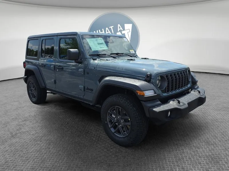2026 Jeep Wrangler Sport S in Anvil Clear Coat — front three-quarter view