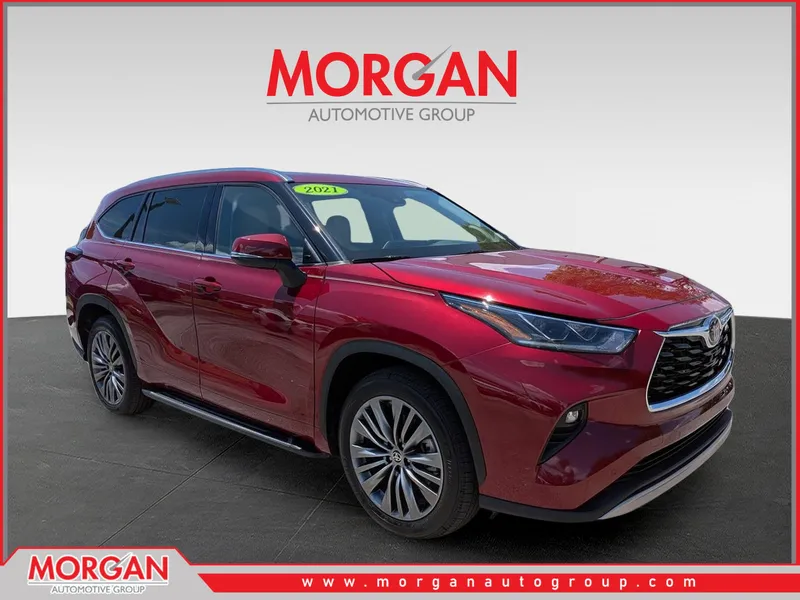 2021 Toyota Highlander Platinum in Pearl — front three-quarter view