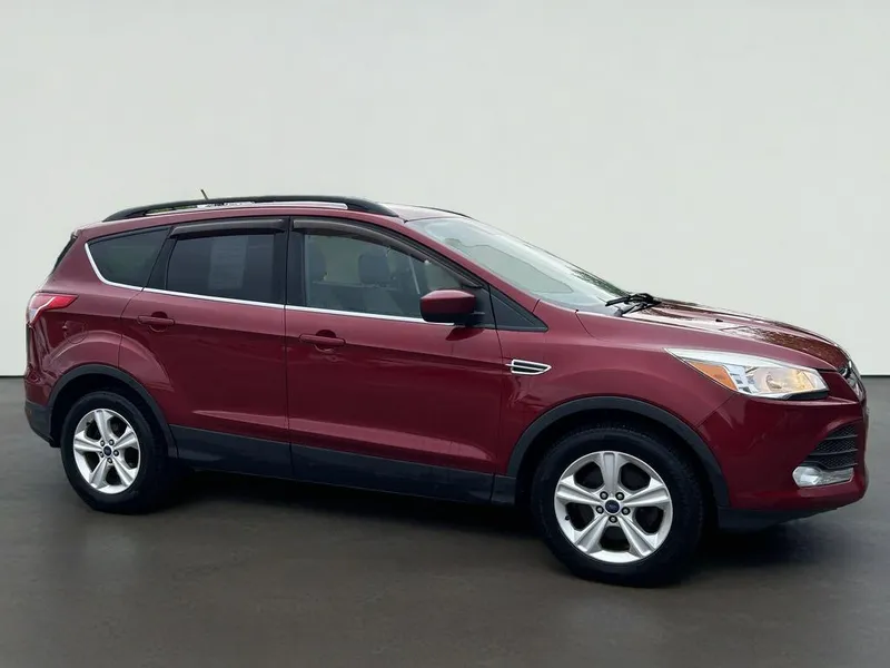 2016 Ford Escape SE in Red — front three-quarter view