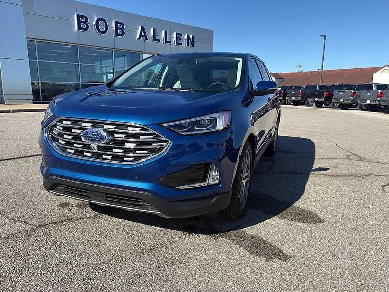 2023 Ford Edge Titanium in Atlas Blue — front three-quarter view