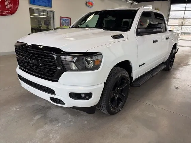 2024 RAM 1500 Big Horn Crew Cab 4x4 5'7' Box in Bright White Clearcoat — front three-quarter view