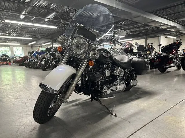 2005 Harley-Davidson® FLSTN - Softail® Deluxe — front three-quarter view