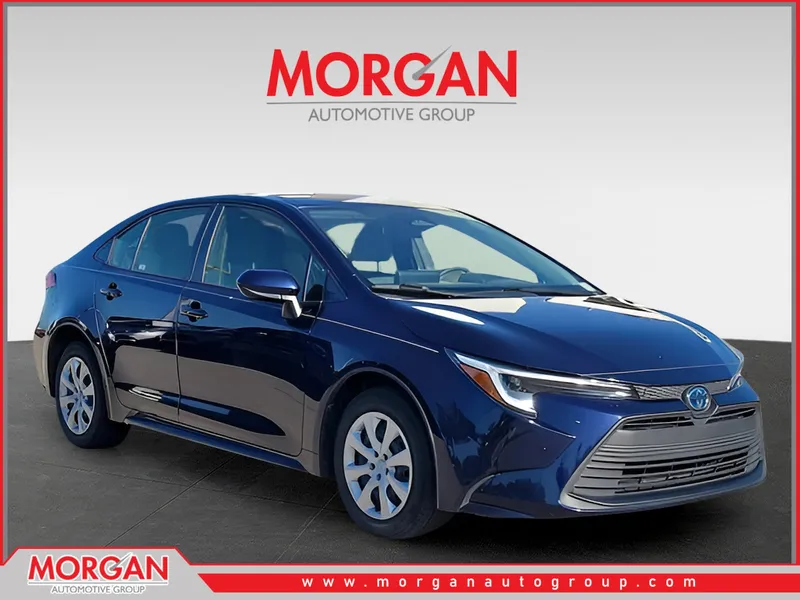 2023 Toyota Corolla Hybrid LE in Blueprint — front three-quarter view