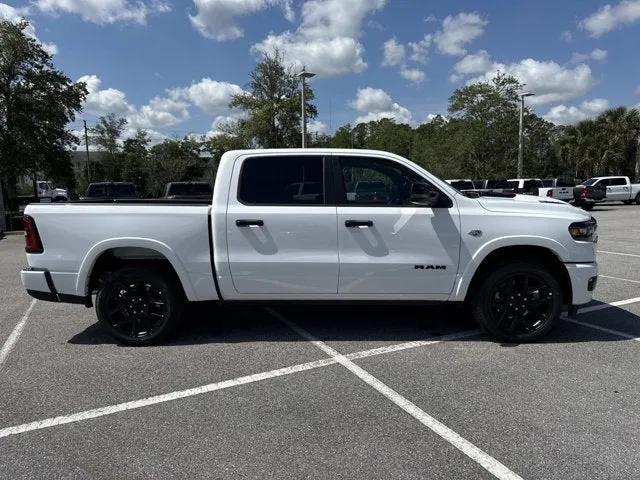 2026 RAM 1500 Laramie in Bright White Clearcoat — front three-quarter view