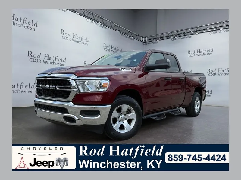 2024 RAM 1500 Tradesman Quad Cab 4x4 6'4' Box in Maroon — front three-quarter view