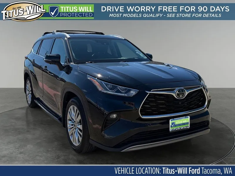 2024 Toyota Highlander Platinum in Midnight Black Metallic — front three-quarter view