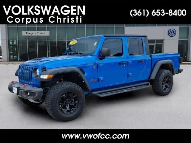 2023 Jeep Gladiator Mojave in Hydro Blue Pearlcoat — front three-quarter view