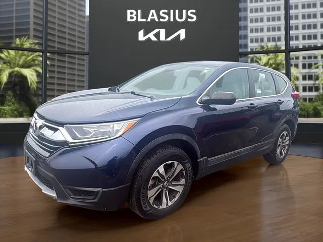 2017 Honda CR-V LX in Obsidian Blue Pearl — front three-quarter view