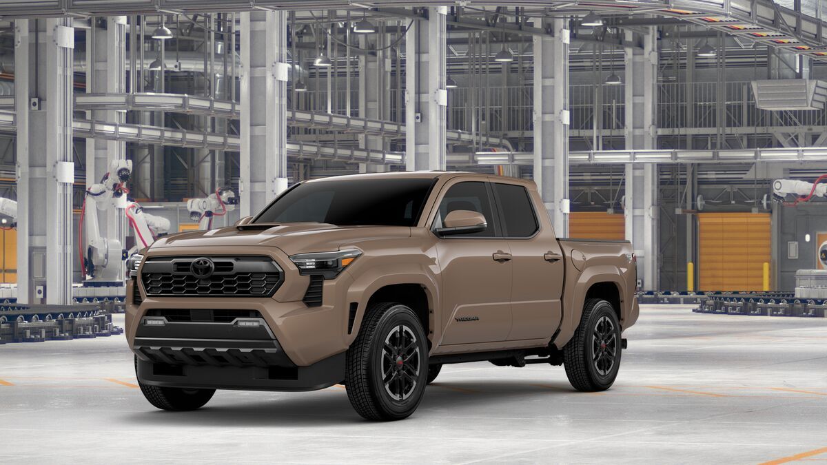 2026 Toyota Tacoma TRD Sport in Mudbath — front three-quarter view