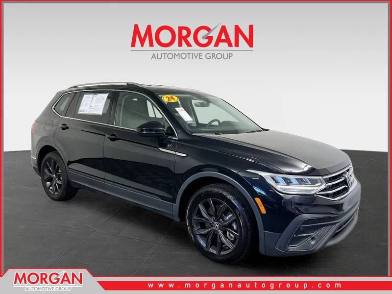 2024 Volkswagen Tiguan 2.0T SE in Deep Black Pearl — front three-quarter view