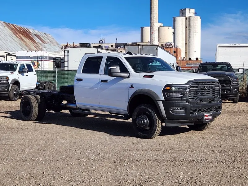 2026 RAM 5500 Chassis Cab RAM 5500 TRADESMAN CHASSIS CREW CAB 4X4 84' CA in Bright White Clear-Coat Exterior Paint — front three-quarter...
