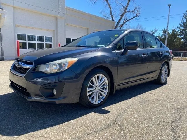 2014 Subaru Impreza 2.0i Limited in Dark Gray Metallic — front three-quarter view
