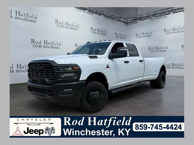 2025 RAM 3500 Tradesman Crew Cab 4x4 8' Box in Bright White Clearcoat — front three-quarter view