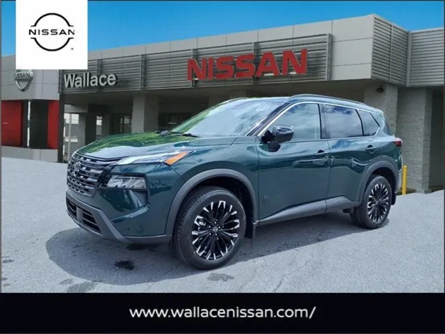 2026 Nissan Rogue Dark Armor in Obsidian Green Pearl Dan — front three-quarter view