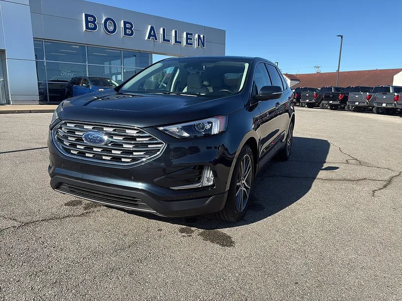 2023 Ford Edge Titanium in Stone Blue — front three-quarter view