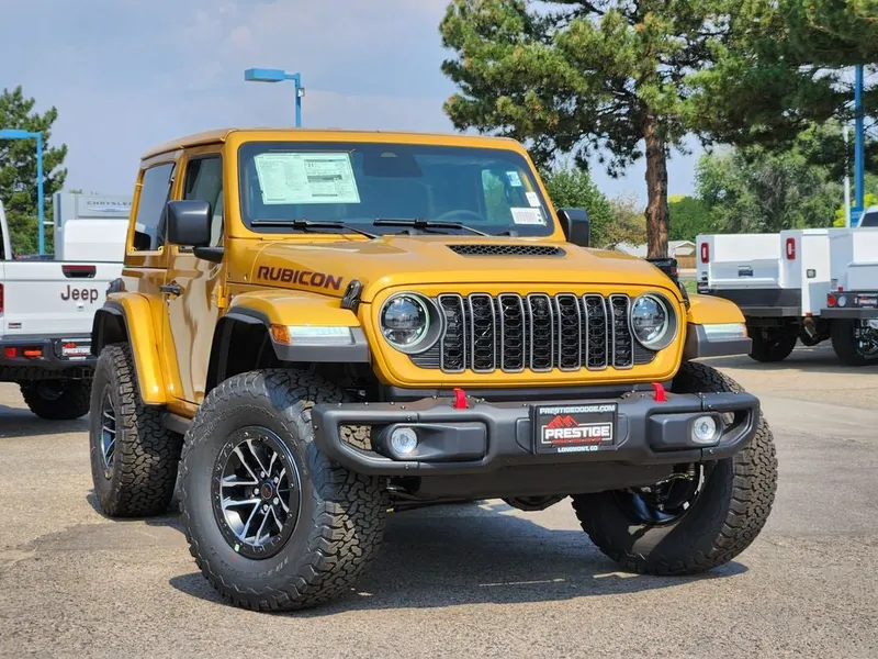 2026 Jeep Wrangler WRANGLER 2-DOOR RUBICON X in Goldilocks Exterior Paint — front three-quarter view
