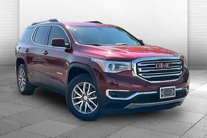 2018 GMC Acadia SLE in Crimson Red Tintcoat — front three-quarter view