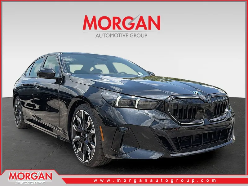 2027 BMW 5 Series 550e xDrive in Black Sapphire Metallic — front three-quarter view