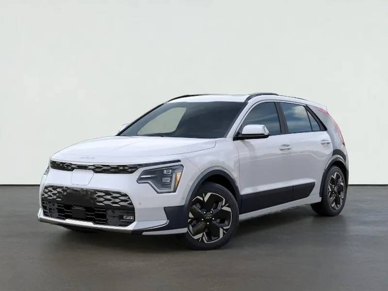 2026 Kia NIRO EV WAVE in Snow White Pearl — front three-quarter view