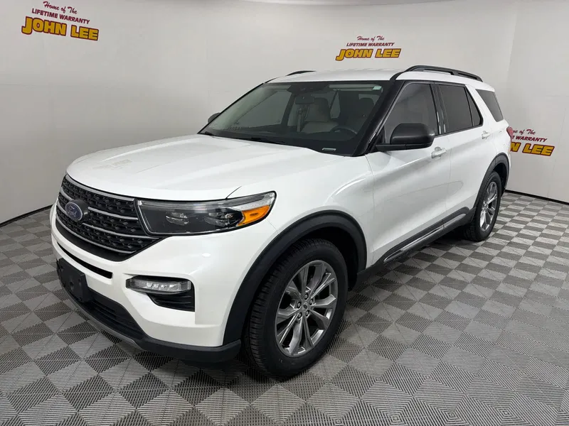 2022 Ford Explorer XLT in Star White Metallic Tri-Coat — front three-quarter view