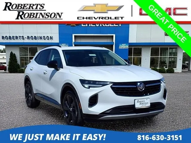 2023 Buick Envision Essence in Summit White — front three-quarter view