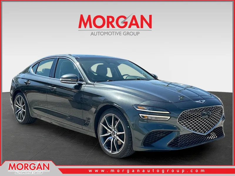2022 Genesis G70 2.0T in Black Forest Green — front three-quarter view