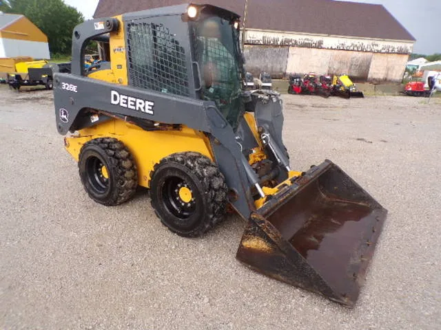 2014 John Deere 326E — front three-quarter view
