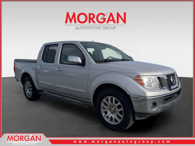 2013 Nissan Frontier SL in Silver — front three-quarter view
