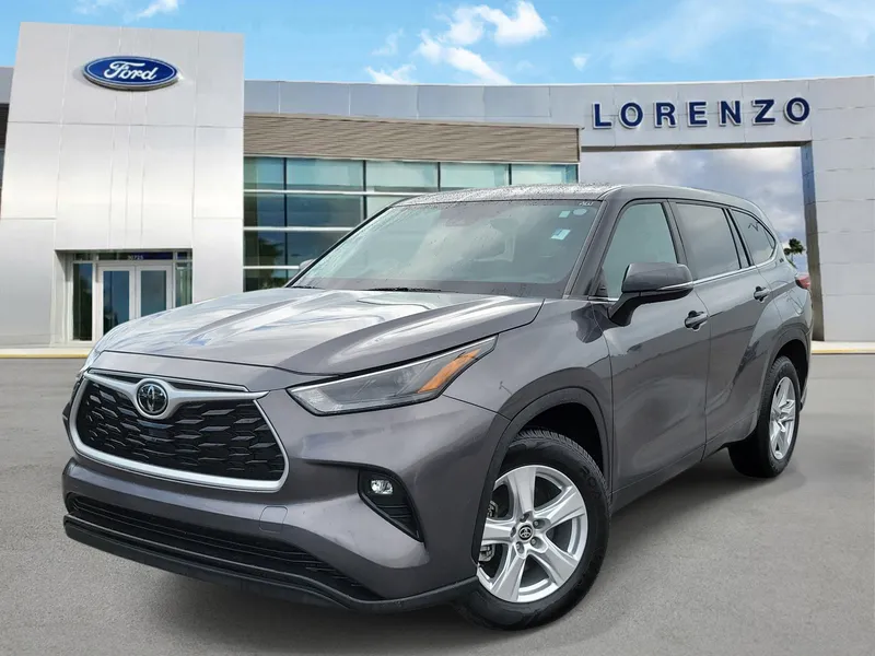 2023 Toyota Highlander LE in Magnetic Gray Metallic — front three-quarter view